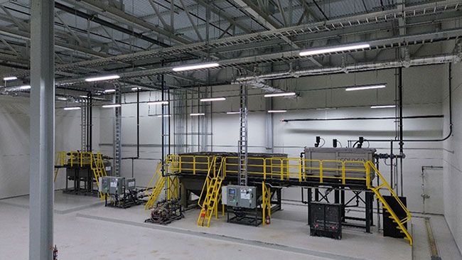 A sophisticated physical/chemical treatment system with chemical reaction tanks, lamella clarifier, and tertiary filtration, demonstrating the scale and integration capabilities of Ecologix Systems solutions for industrial clients