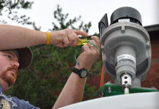 Engineer maintenance on a mixer