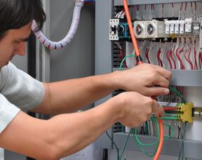 Controls engineer working on a wastewater treatment system