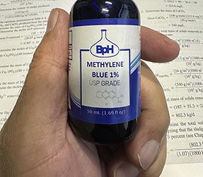 Methylene Blue, a compound used as an antidote to reduce methemoglobin back to hemoglobin in treatment.